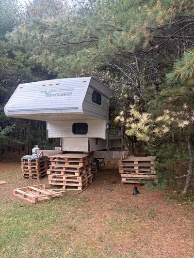 97 truck camper, no leaks, has wet bath inside and also an outdoor shower, stove works, no fridge as...