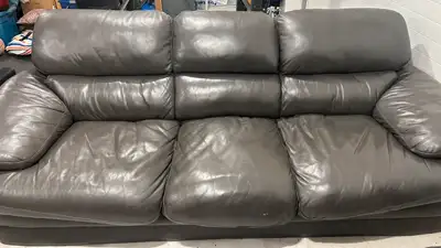 Leather couch Free delivery Non smoking household price negotiable