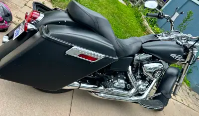 $8000 obo 2012 custom painted matte black harley In great condition, started perfected after the win...