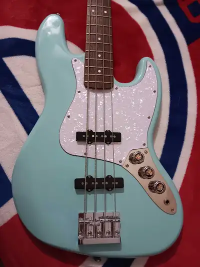Squier 60's Vibe Jazz Bass 4 string like new and Mods added.