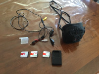 Camera accessories, batteries NP-BG1, charger, camera case + 