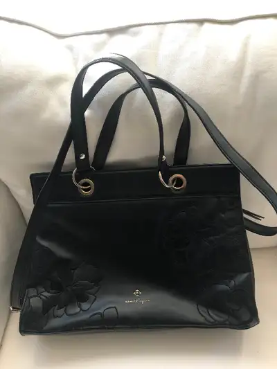 Like new black Nanette Lepore purse w/suede flowers, View more