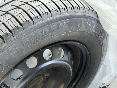 205/65R15 Michelin X-ICE Good Condition (only had them for a year and a half) 4 tires (bolts include...