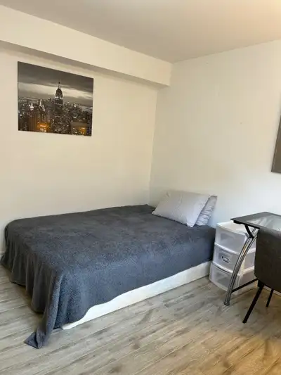 Clean and spacious furnished room for rent. Available ASAP for single woman only. Full size bed, des...