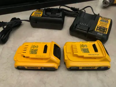 2 20 volt dewalt batteries and 2 chargers, View more