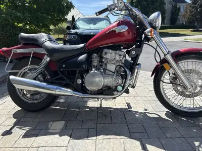 For sale is a Kawasaki Vulcan 500, a sleek cruiser-style motorcycle known for its smooth ride and re...