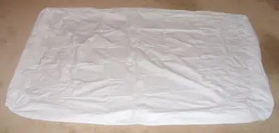 contoured plastic mattress cover for single bed - good condition