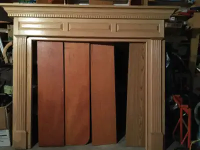 Beautiful oak dove-cove fireplace mantel surround. Measurements: Base 70-1/4” wide x 64 -1/4” high....