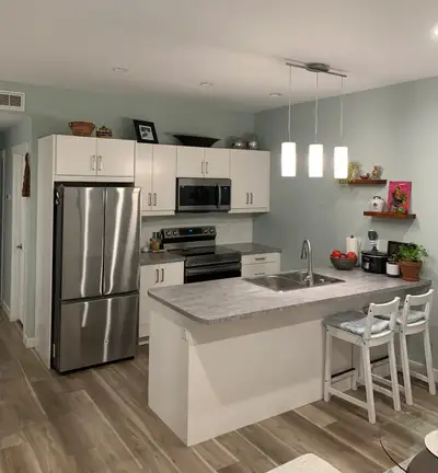 Location central to many amenities . 2-bedroom, 1 bathroom second floor walk-up suite measuring 750...