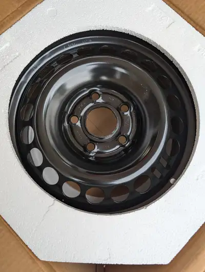 Selling a set of four Brand New Genuine GM - 5 x 120 - 16" Satin - black steeliest. Compatible with...