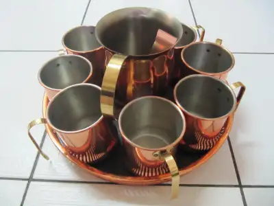 Up for sale is a vintage classic eleven piece lot of Copper Craft Guild Moscow Mule Mugs and ice pit...