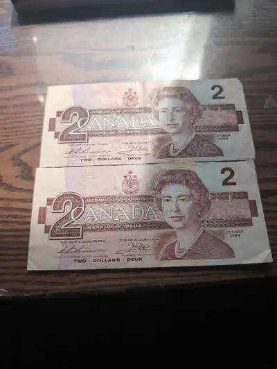 2 billets de 1986 de 2$ dollars canadien très très rare