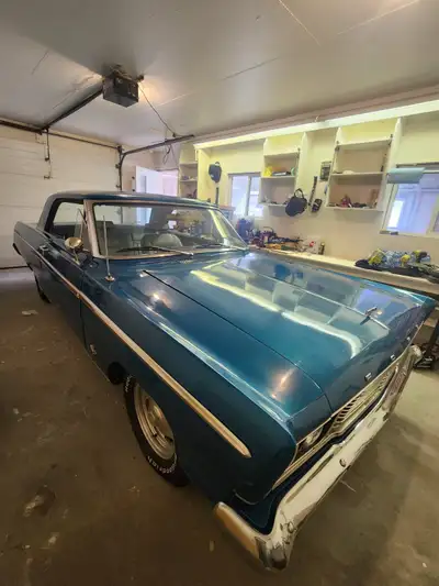 Drives, registered in B.C., comes with new headliner material and car cover