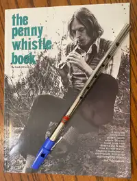 Penny whistle and book 