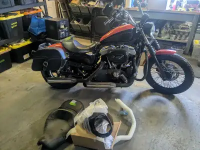 2009 Nightster 1200 XL 30000 km with lots of extras Must have coffee cup holder mounted ! Great comm...