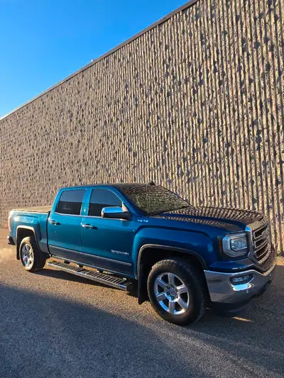2018 gmc 1500 slt. 165000km . Leather heated seats , heated steering wheel, good tires, tinted windo...