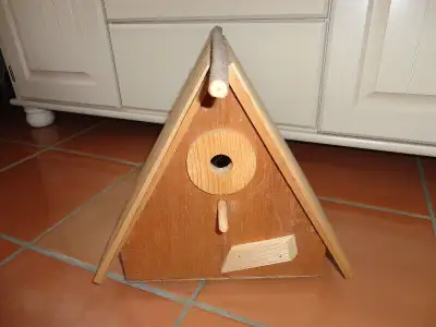 Wooden Bird House, size is 12 1/2 inches tall, $20.00. Tillsonburg