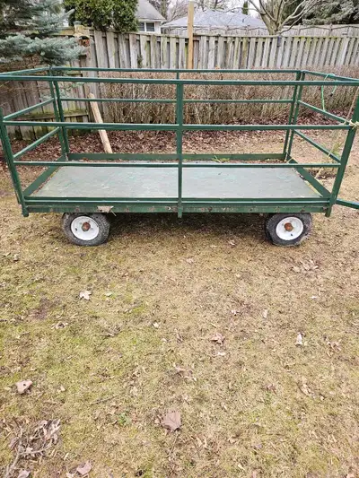 Custom fabricated heavy duty firm wagon. Can open front and back or remove all sides for a flatbed....