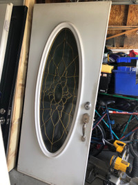 Exterior Metal  door 33.75”x79” with oval glass insert 