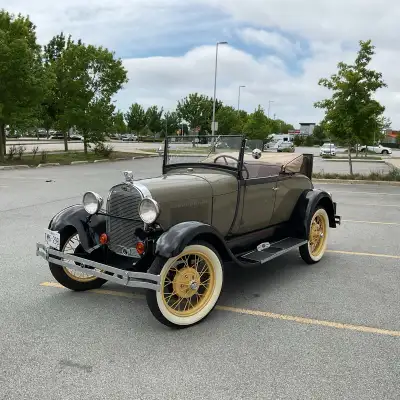 1928 Model ‘A’ Roadster with rumble seat. All steel body, no rust. Painted ‘French Gray’ with darker...