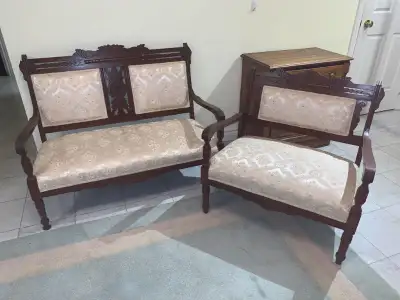 Matching Walnut Victorian Eastlake settee sofa and loveseat set. Solid wood in excellent condition....