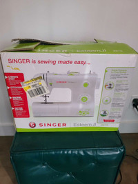 Singer Esteem 2273 used like new perfect working. 