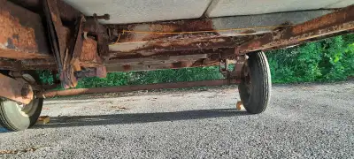 11 feet x 8 feet inside snowmobile trailer for sale. Needs new frame. Clam shell in good shape. $135...