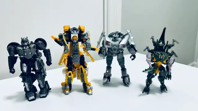 Transformers Action Figures – Lot of 4 – Bumblebee – Sold As Is