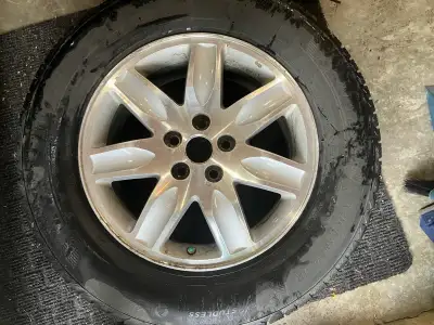 4 Michelin 235/65 R17 X-ICE snow SUV winter tires . On older alloy rims. Bolt pattern 5-114.3mm. Tir...
