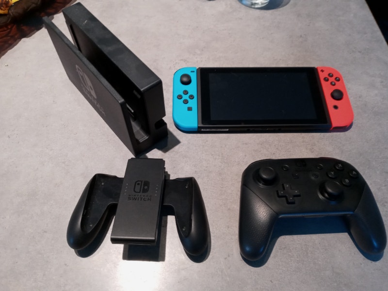 Nintendo Switch Red/Blue Console/Travel Case/Controller Bundle