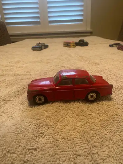 Vintage Corgi Toys Volvo 122S diecast car made in Great Britain from the 1960s. Classic red Volvo Am...
