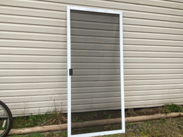 Adjustable Sliding Screen Door in Windows, Doors & Trim in Campbell River