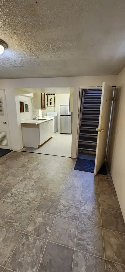 This basement apt includes all utilities wifi this is for a single person large living room area sho...
