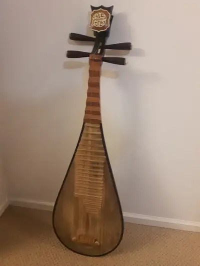 Nice Antique beautiful 4 String Chinese Lute Guitar. It's a conversation piece! It has all 4 strings...