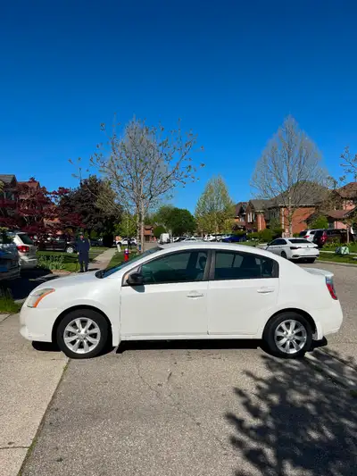 2011 Nissan Sentra, Driven 170K Kilometers. Automatic. Clean Black Interior. Loaded with many option...