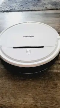 Robotic vacuum/mop