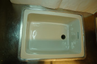 White Vintage Porcelain sink(s); 1 with overflow feature