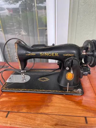 Vintage Singer sewing machine with accessories and bench singer, View more