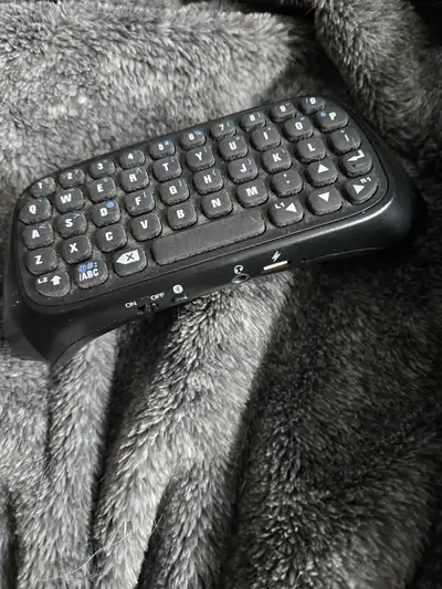 Plugs into your ps4 controller to allow for keyboard use. Comes from a smoke free house located in t...