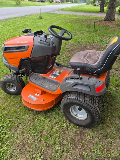 Husqvarna lawntractor. 24 HP engine,42" heavy duty fabricated deck. tractor has 407 hours. engine ha...