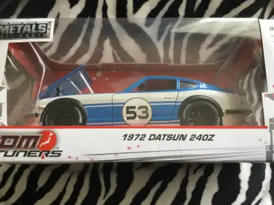 You are looking at a JDM TUNERS new in package very nice condition no major bends or creases corners...