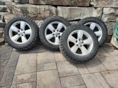 LT275/60R20 all terrain T/A on Dodge rims nitrogen filled. Off of a 21 RAM 1500. Only used in winter...