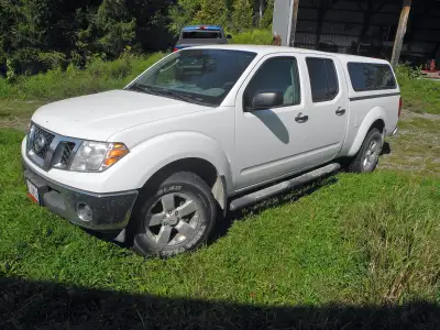 Good condition, no accidents, 176,000 km; includes pickup cap, winter tires on rims and trailer hitc...