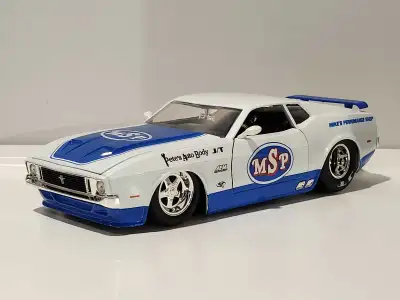 1973 Ford Mustang Mach 1 (pearl/blue) 1:24 diecast model. , View more