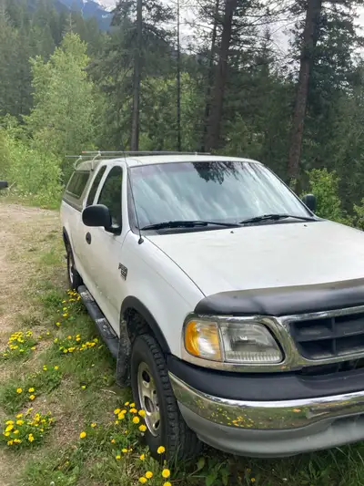 Amazing old 4x4 truck. 5.4L V8 runs strong. Ext cab. Short box Canopy. Recently had 8 new spark plug...
