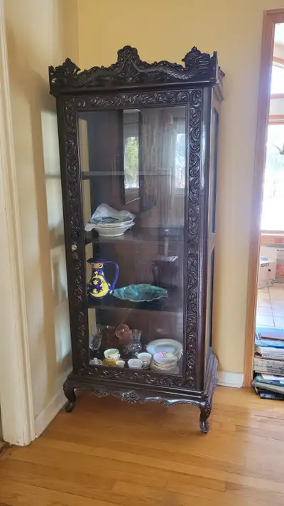 Ornate teak cabinet from Indonesia, View more