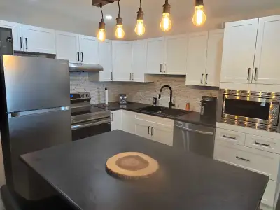 Amazing furnished condo in Village Minute walk to bus, groceries, restaurants. Temporary stays. 2 mo...