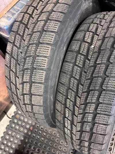 These are 4 Firestone WeatherGrip snow tires, size 225/65R17, perfect for winter driving. They are u...