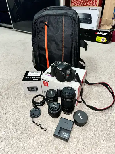 I'm selling my Canon EOS Rebel SL2, a fantastic DSLR camera that's in good condition, perfect for ph...