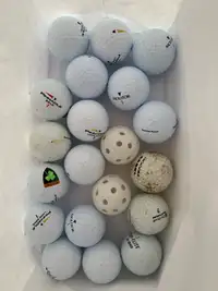 18 Used Golf Balls + 2 practice balls